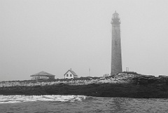 Fog Rolls in Around Petit Manan Lighthouse in Maine -BW